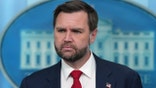 Vice President JD Vance listens during press briefing