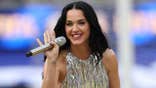Singer-songwriter Katy Perry performing on stage at Los Angeles Stadium.