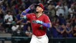 Ketel Marte of the Arizona Diamondbacks celebrating after hitting a home run at Chase Field