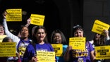 Airport workers rally on Tuesday, July 1