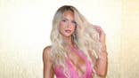 Marissa Ayers walking on runway at Miami Swim Week event