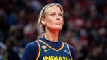 Indiana Fever guard Sophie Cunningham dribbling basketball at Gainbridge Fieldhouse