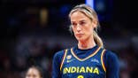 Indiana Fever guard Sophie Cunningham dribbling basketball during game at Gainbridge Fieldhouse
