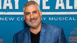 Taylor Hicks standing in front of a microphone at Tennessee Performing Arts Center in Nashville