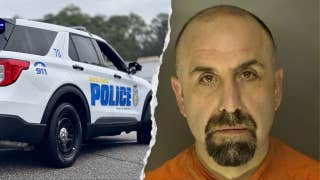 Detective arrested after allegedly pulling gun on fellow officer for microwaving fish at police station