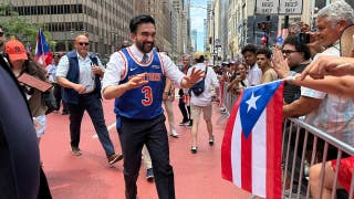 Mamdani parties with Knicks champion Jose Alvarado on Puerto Rican Day Parade float in New York