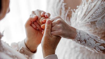 Tearful reunion caught on camera as bride visits her ill mom in bridal attire - Fox News