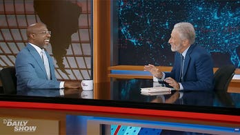 'I put up with politics': Sen Raphael Warnock confesses to Jon Stewart he is 'not in love' with the system