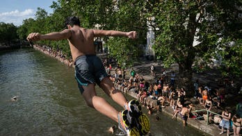 Popular city bans public alcohol amid heat wave as people take risks to cool down