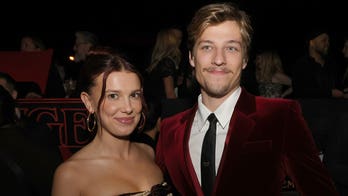 Millie Bobby Brown defends husband Jake Bongiovi after critics blast him for not helping with their bags