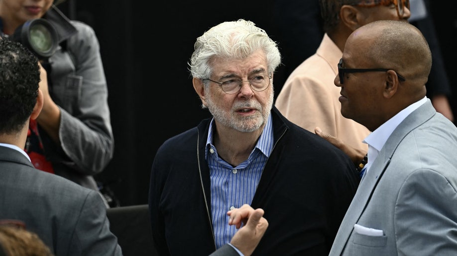 George Lucas arrives at Obama's Presidential Center opening