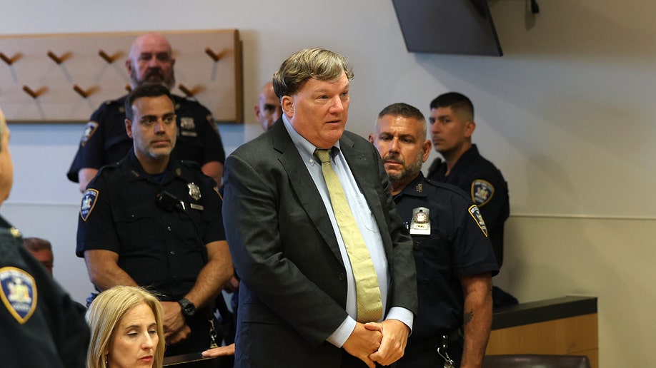 Gilgo Serial Killer Rex Heuermann stands in court for sentencing.