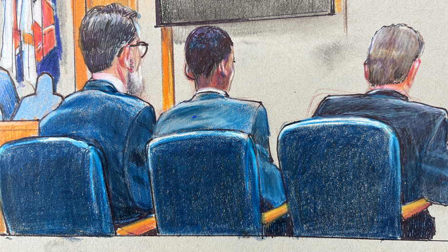 Courtroom sketch showing Karmelo Anthony seated with his defense team during his murder trial