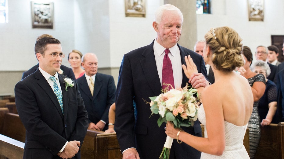 Bride is walked down wedding aisle by man who received her late father's heart