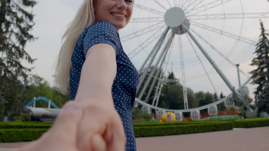Couple set mood for Guns N' Roses by hooking up on a Ferris wheel & best friend's wife sends birthday suit pic