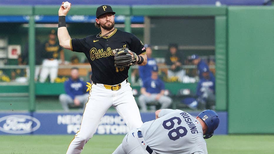 Dodgers catcher Dalton Rushing executes a slide so