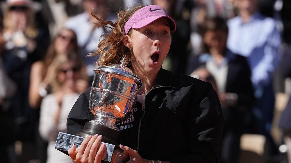 French Open winner Mirra Andreeva quickly corrects trophy pose after historic victory