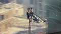 Two people taken into custody after climbing to the top of Empire State Building with massive banner - Fox News