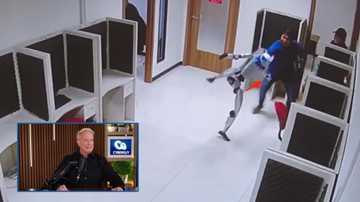 humanoid robot swings toward a worker