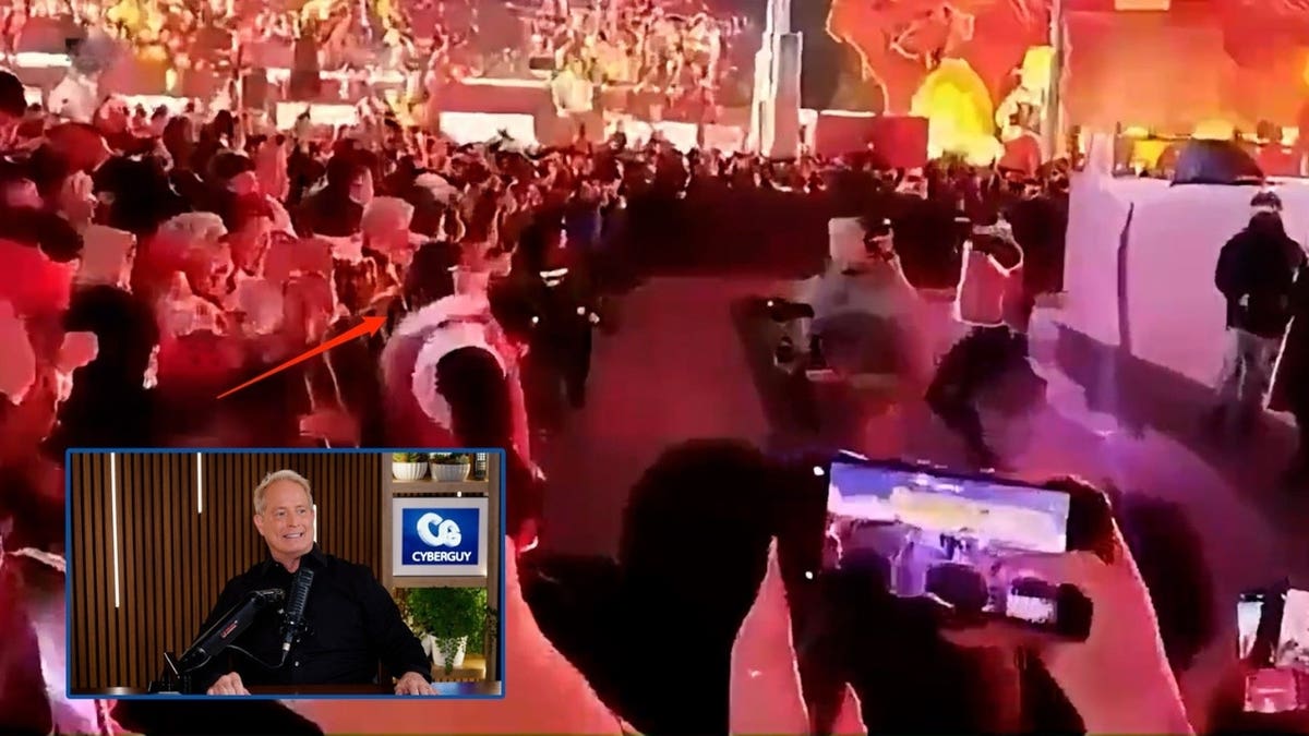 robot moves through a packed public event