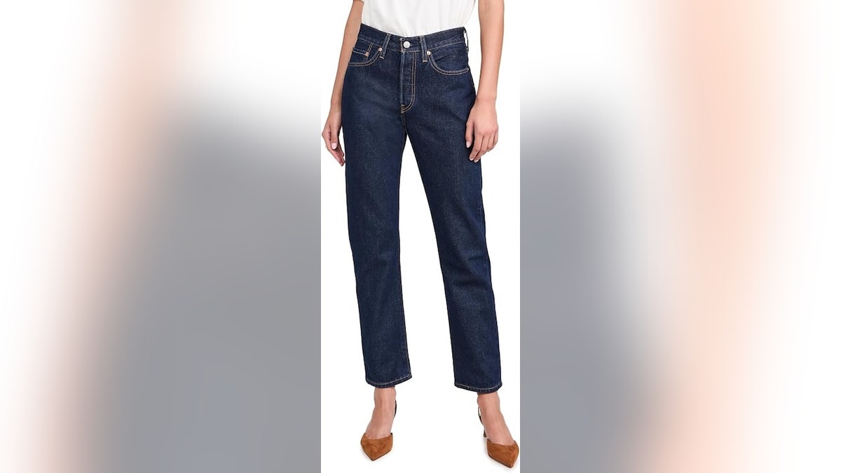 This style features the brand's iconic straight-leg silhouette and button fly.