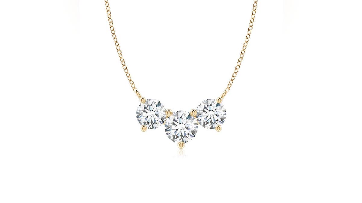 Get three lab-grown diamonds on one gold chain. 