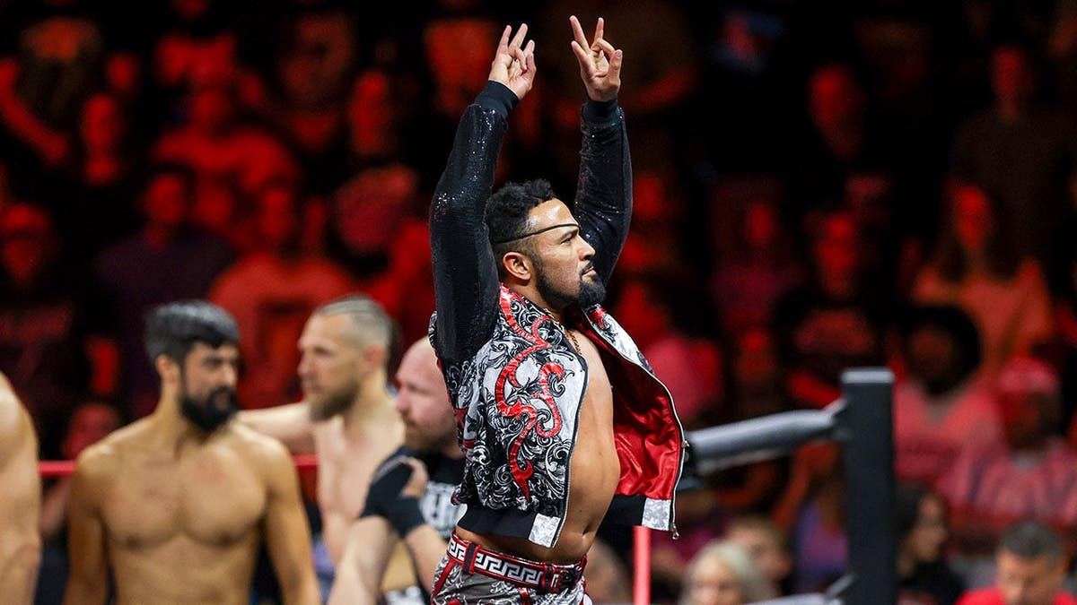 Rocky Romero on the top rope