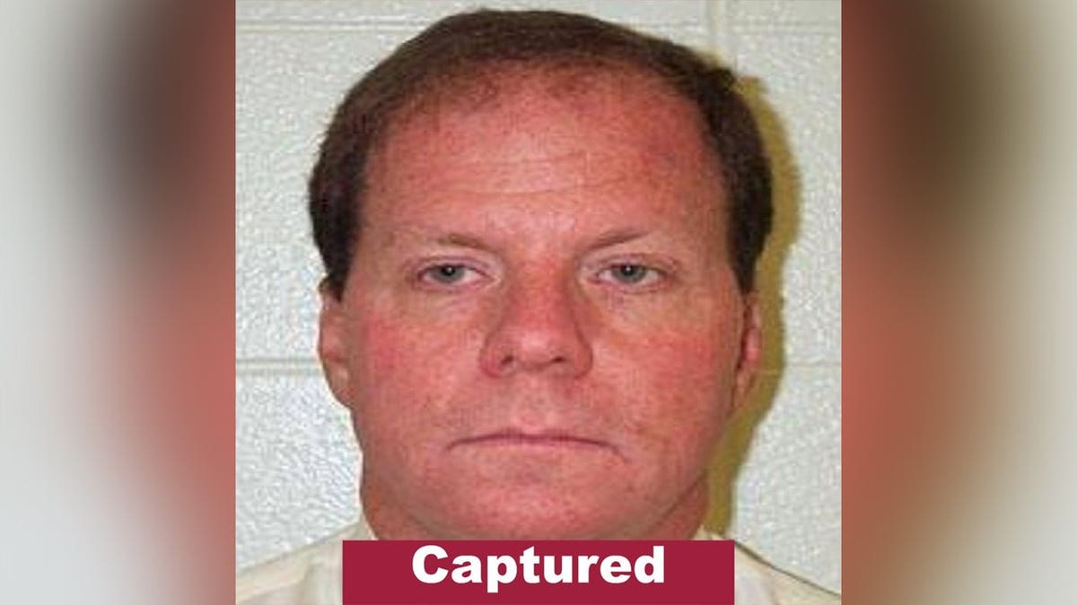 A Rhode Island State Police wanted poster shows Ronald L. Fischer with a red 