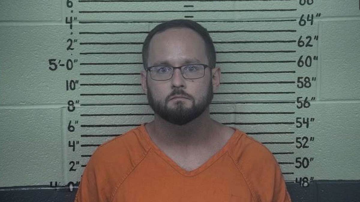 David Elliott Pritt, a West Virginia lawmaker and former teacher, in a booking photo after his arrest on federal charges alleging he enticed a minor