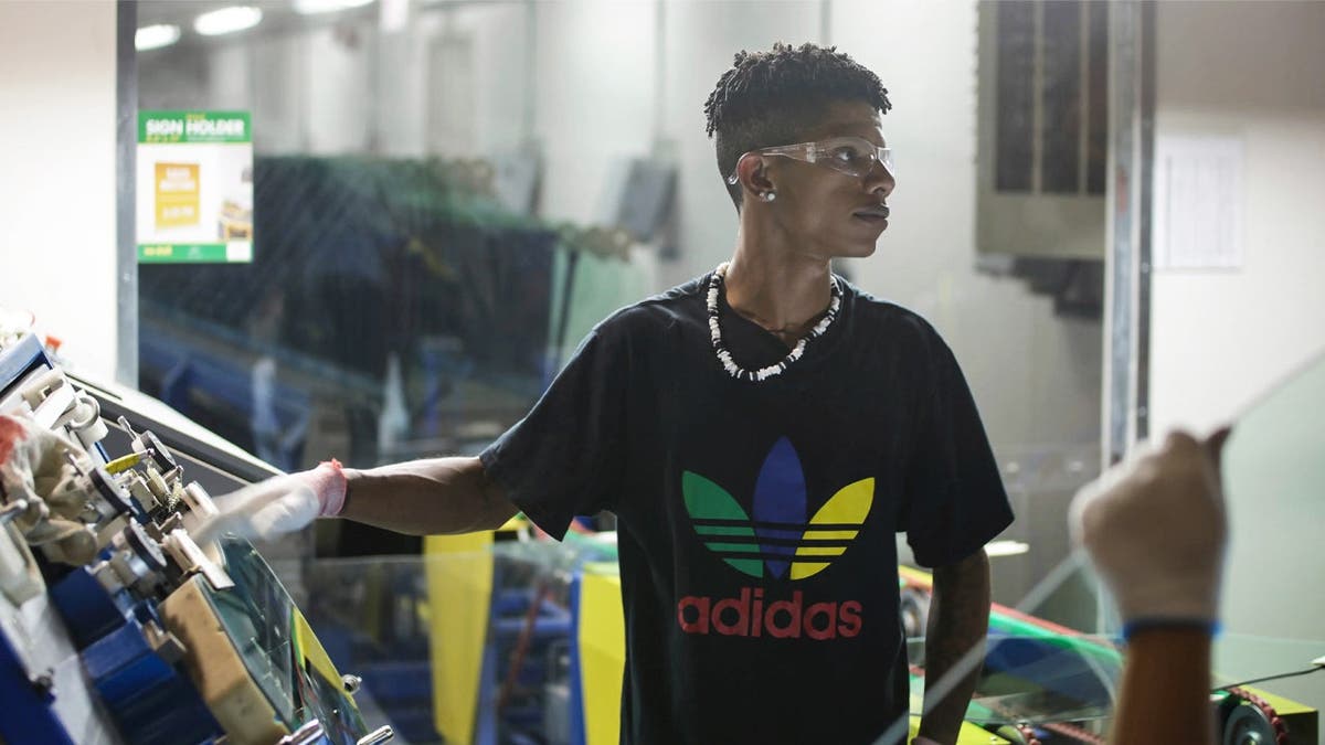 This image released by Netflix shows Zach Ray at work at the Fuyao Glass America factory in Dayton, Ohio, in a scene from the Oscar-nominated documentary