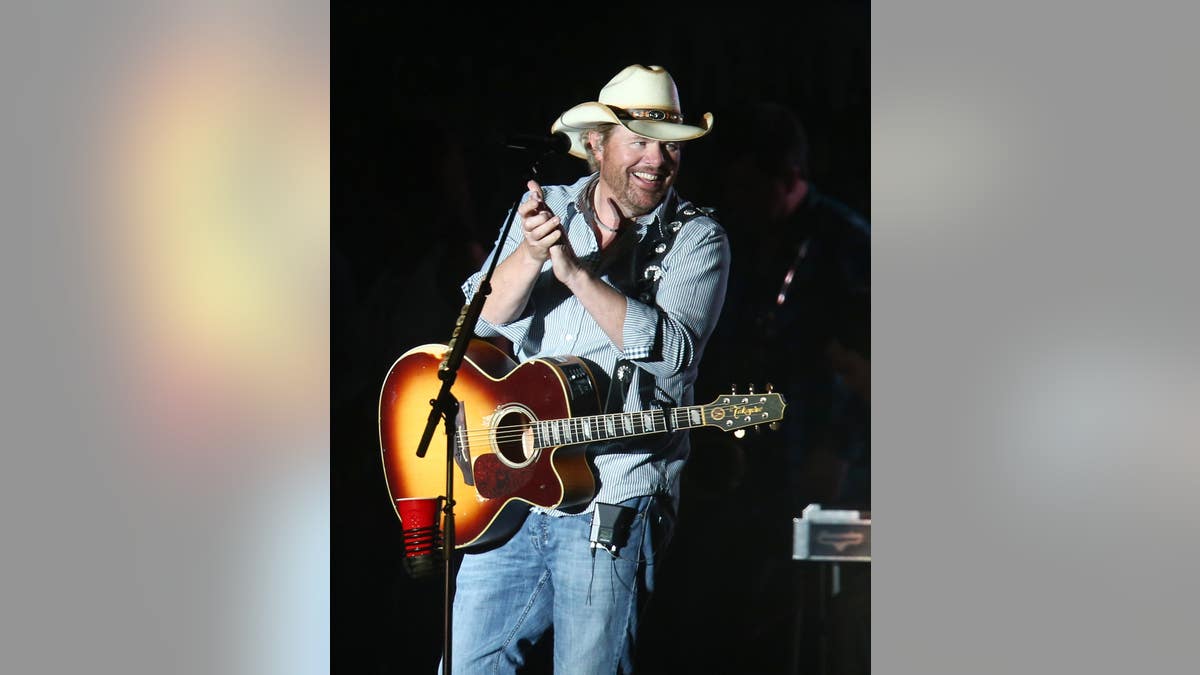 INDIO, CA - APRIL 26: Musician Toby Keith performs onstage at day 1 of the 2013 Stagecoach California's Country Music Festival at The Empire Polo Field on April 26, 2013 in Indio, California. (Photo by Christopher Polk/Getty Images for Stagecoach)