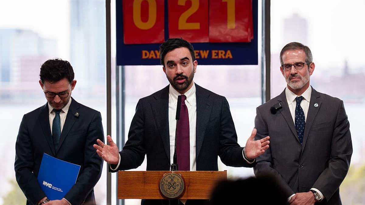 Sam Levine, commissioner of the New York Department of Consumer and Worker Protection, from left, Zohran Mamdani, mayor of New York, and Rich Maroko, president of the Hotel and Gaming Trades Council (HTC), during an announcement on junk fees in the Susan and John Hess Family Theater