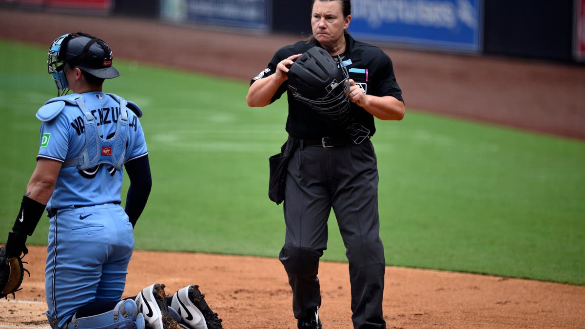 Umpire Jen Pawol looks on at Petco Park.