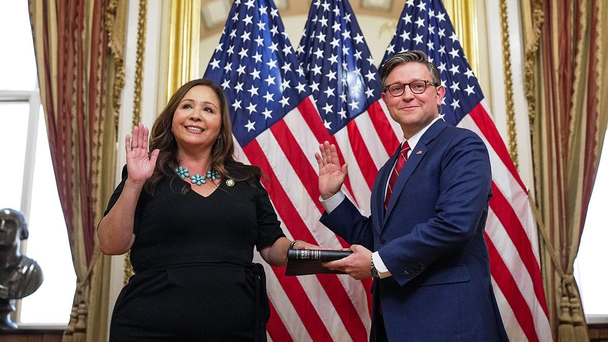 U.S. Rep. Adelita Grijalva (D-AZ) poses for a photo with Speaker of the House Mike Johnson (R-LA) during a ceremonial swearing-in at the U.S. Capitol Building on November 12, 2025 in Washington, DC. Grijalva won a special election to replace her late father Rep. Raul Grijalva on September 23.