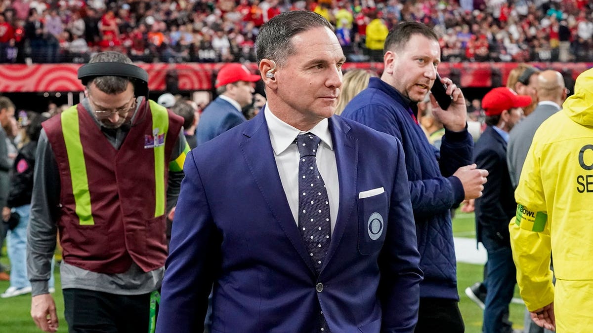 Jay Feely walks connected nan Allegiant Stadium sideline