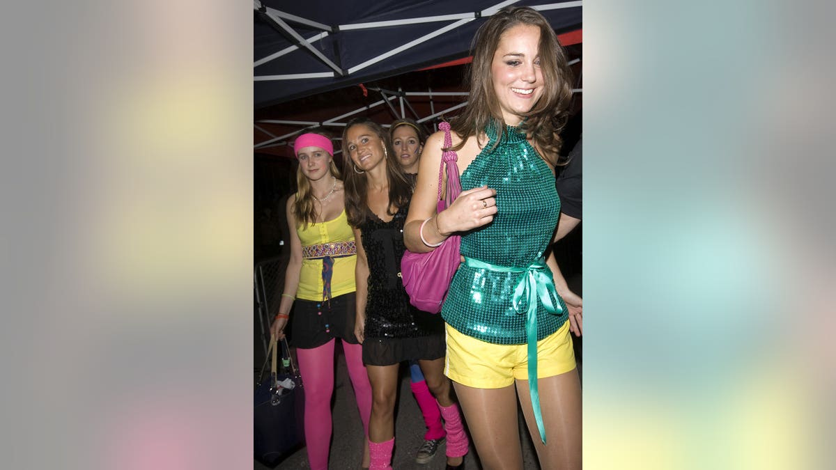 Kate Middleton and Pippa Middleton arrive at a roller disco event.