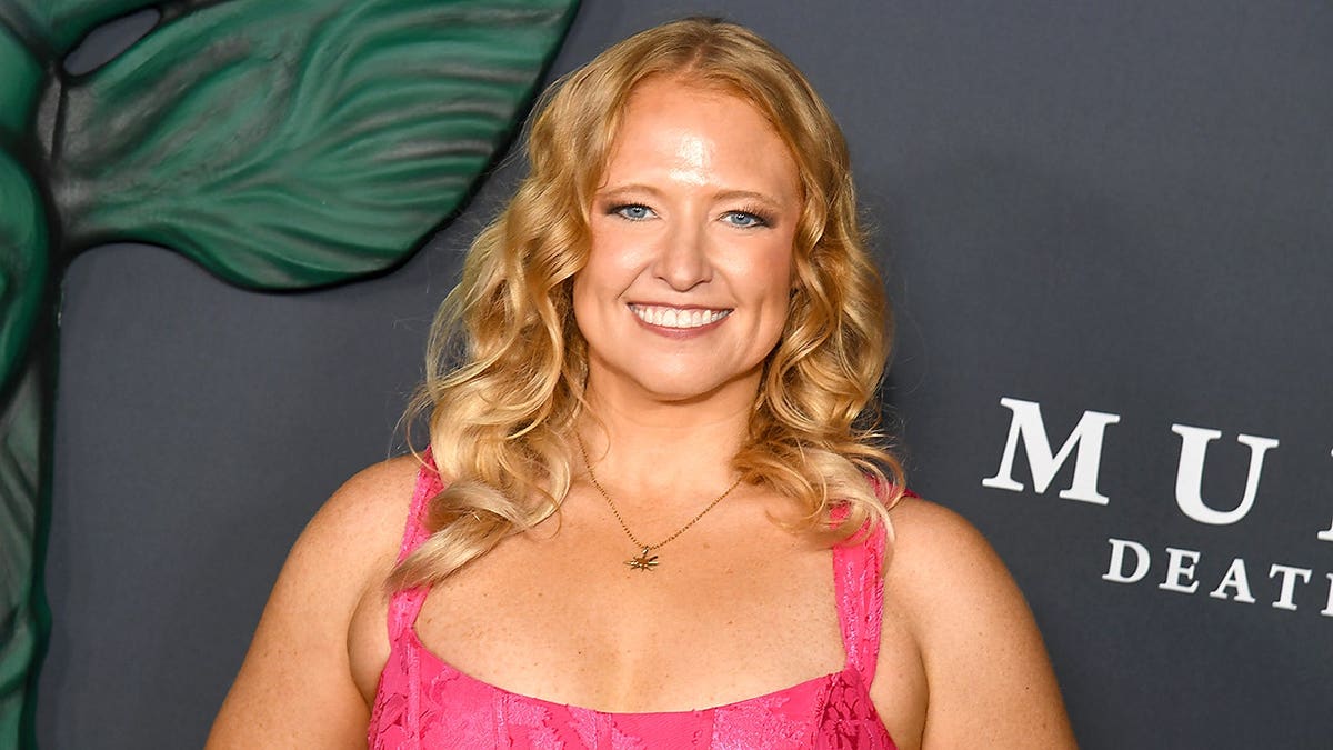 Mandy Matney poses on the red carpet at the premiere of Netflix's 