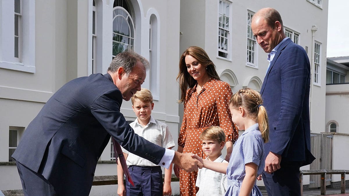 Prince George and family arrive at Lambrook School with Headmaster Jonathan Perry greeting them.