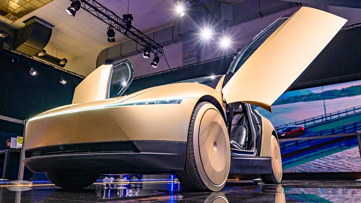 A Tesla Robotaxi on display.