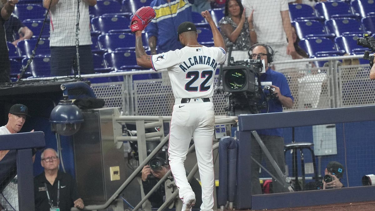 Miami Marlins starting pitcher Sandy Alcantara (22) thanks the fans as they celebrate his 1,002 career strikeouts during a game against the Texas Rangers at Depot Park.
