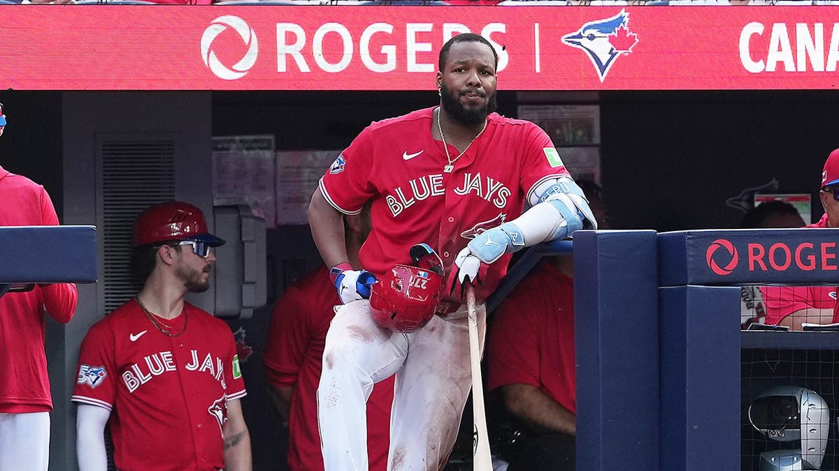 Jul 1, 2026; Toronto, Ontario, CAN; Toronto Blue Jays first baseman Vladimir Guerrero Jr. (27) waits for his turn at bat against the New York Mets during the sixth inning at Rogers Centre. Mandatory Credit: Nick Turchiaro-Imagn Images