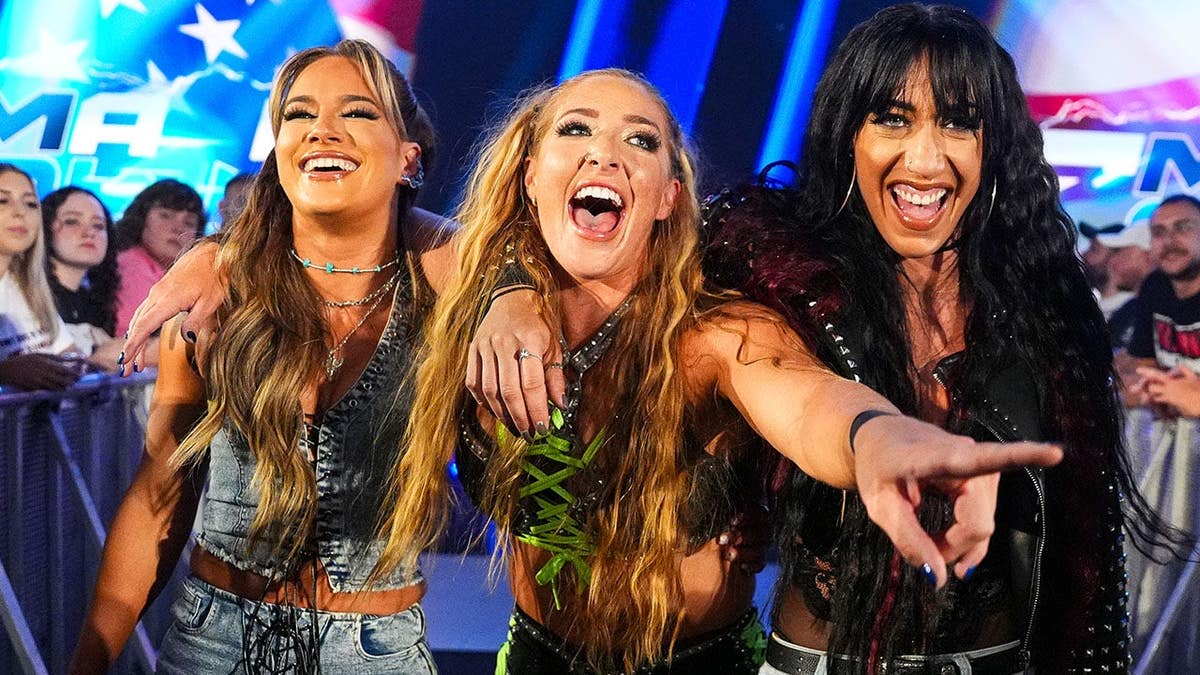 Fallon Henley, Lainey Reid and Jacy Jayne celebrate during SmackDown in Atlantic City.