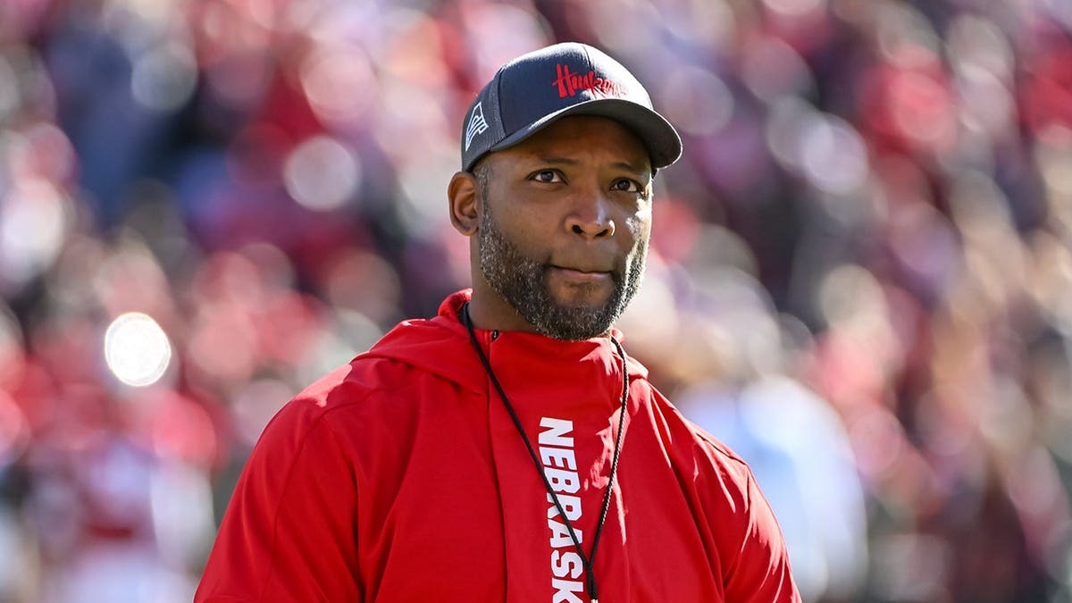 Ahman Green stands on the field during a game break at Memorial Stadium.