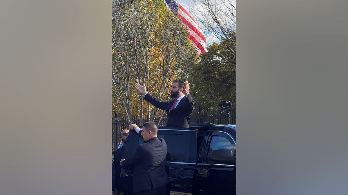 Syria's President Ahmed al-Sharaa greets supporters after meeting with U.S. President Donald Trump at the White House in Washington, D.C., U.S., November 10, 2025.