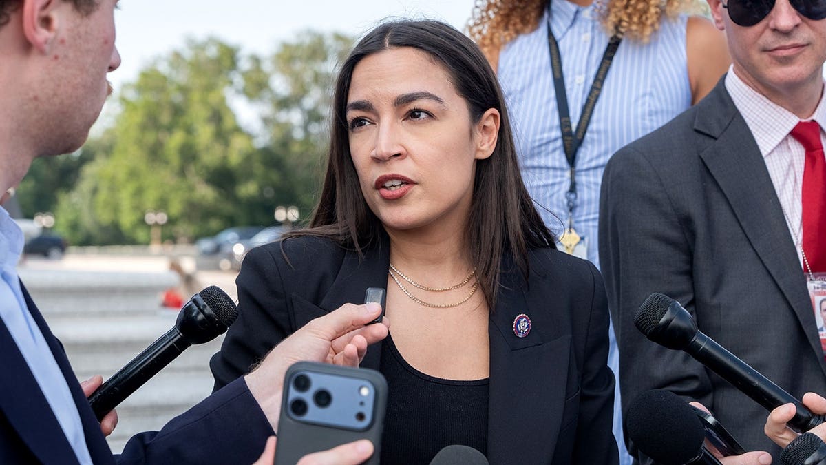 AOc talking to reporters