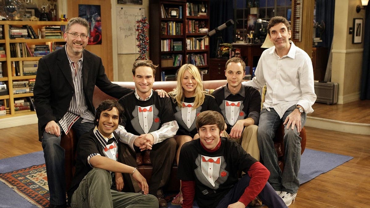 The Big Bang Theory cast poses on set with executive producers in Los Angeles.