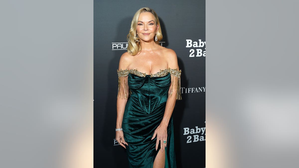 Brandy Ledford in a green dress at the Baby2Baby Gala.