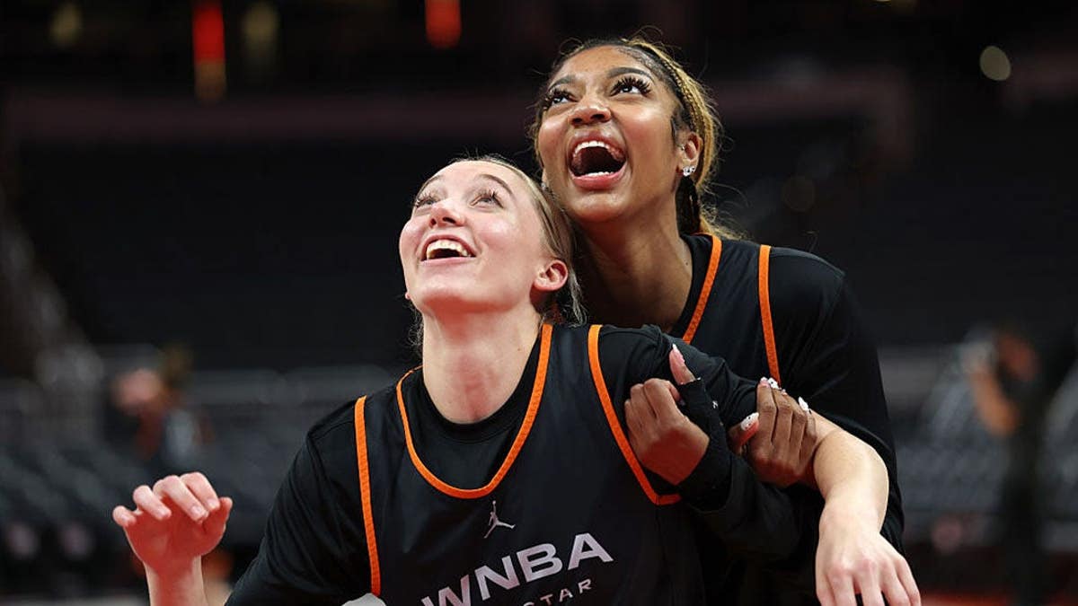 Paige Bueckers #5 of the Dallas Wings and Angel Reese #5 of the Chicago Sky