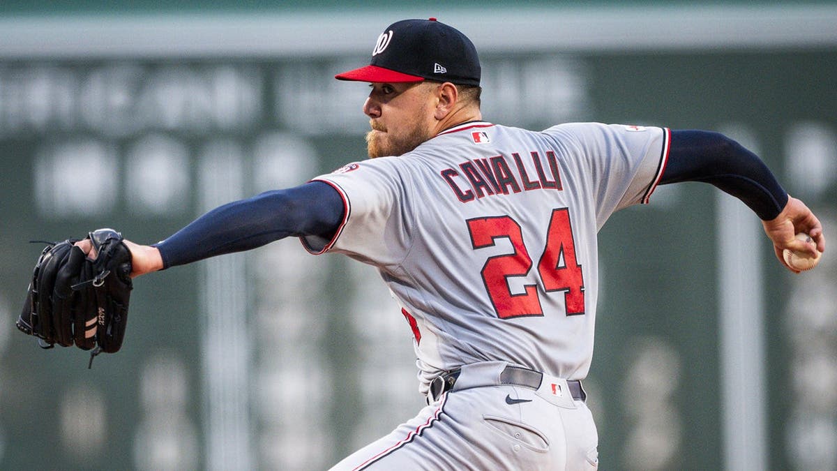 Cade Cavalli, Washington Nationals pitcher, throws a transportation successful the archetypal inning astatine Fenway Park.