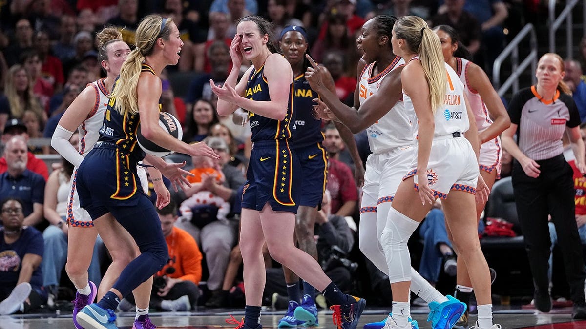 Caitlin Clark #22 reacts after being fouled during an Indiana Fever game.